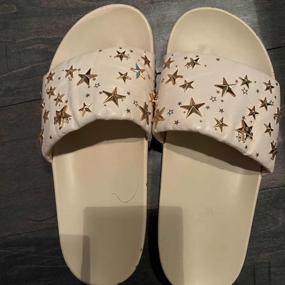 Tory Burch Creme Size 7 Slide Sandals with Gold Stars.